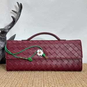Bottega Veneta Andiamo Clutch with Daisy Flower Closure In Intrecciato Leather Burgundy