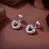 Bottega Veneta Hollow Heart Stud Earrings In Metal Silver