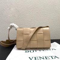 Bottega Veneta Medium Cassette Crossbody Bag with Triangle Buckle In Intreccio Wax Leather Apricot