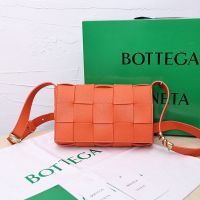 Bottega Veneta Medium Cassette Crossbody Bag In Intreccio Grained Calfskin Orange