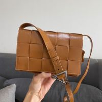 Bottega Veneta Medium Cassette Crossbody Bag with Triangle Buckle In Intreccio Waxed Calfskin Brown