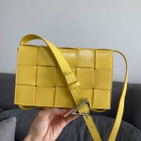 Bottega Veneta Medium Cassette Crossbody Bag with Triangle Buckle In Intreccio Waxed Calfskin Yellow