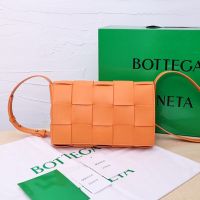Bottega Veneta Medium Cassette Crossbody Bag In Intreccio Calfskin Orange