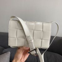 Bottega Veneta Medium Cassette Crossbody Bag with Triangle Buckle In Intreccio Waxed Calfskin Beige