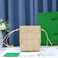 Bottega Veneta Small Cassette Bucket Bag In Intreccio Lambskin Apricot