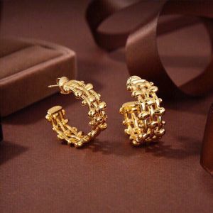 Bottega Veneta Braided Hoop Earrings In Metal Gold