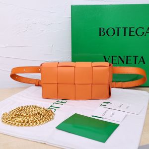 Bottega Veneta Mini Cassette Belt Bag In Intreccio Calfskin Orange
