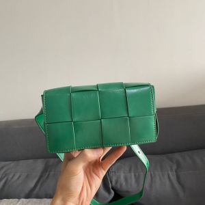 Bottega Veneta Mini Cassette Belt Bag In Intreccio Waxed Calfskin Green